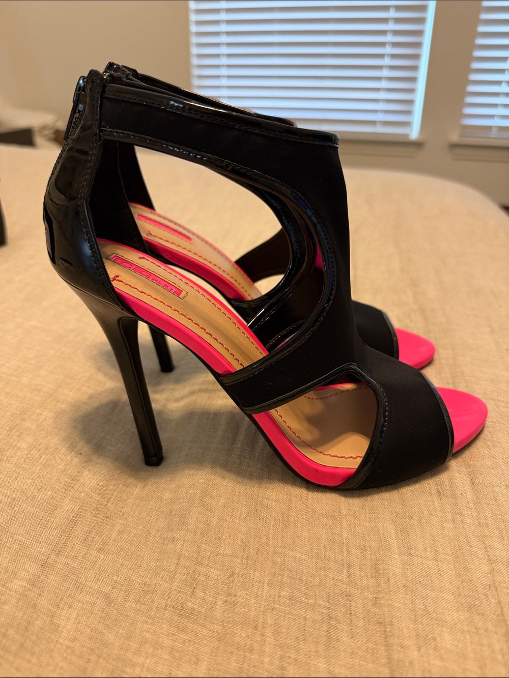 BCBG Black Cutout Stiletto Sandals with Hot Pink Accents
